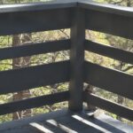 Airbnb deck with squirrel in the corner